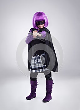 Theres a new hero in town. A studio shot of a confident little girl playing dress-up.