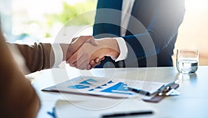 Theres no doubt that well work well together. Closeup shot of two unidentifiable businessmen shaking hands in an office.