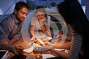 Theres no I in team. Shot of a group of young business professionals having a meeting.