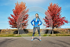 Theres no shattering her strong determination. a sporty young woman standing outdoors.