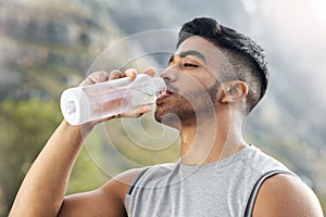 Theres nothing better for you than water. a man drinking water while out for a workout.