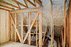 thermal and hidro insulation with spray foam at house construction photo