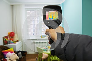 Thermal imaging camera inspection of building. check temperature photo