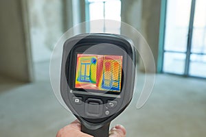 thermal imaging camera inspection of window building. check heat loss