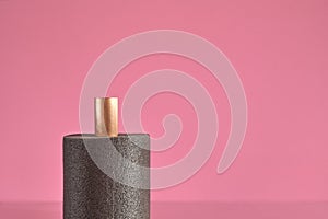 Thermal insulation covering copper tube closeup, pink background, copy space