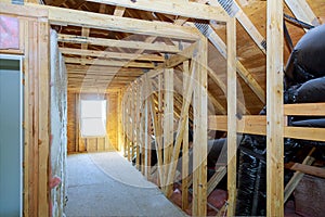 Thermal insulation in process of construction frame attic house newly constructed home