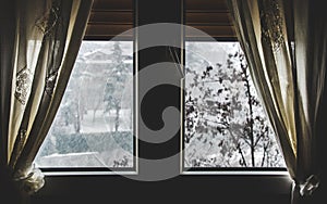 Thermal insulation window save energy bills snow fall view winter dark window curtain stay home snowing outside