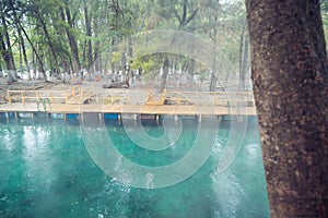 Thermal lagoon under deep sky , Blurred photo of morning fog over a lake in cold autumn weather in half moon san luis potosi