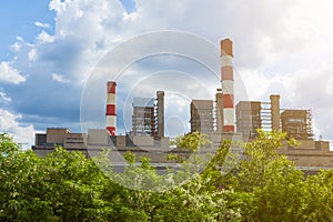 Thermal power plant with chimneys in the nature