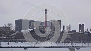 Thermal power plant in Moscow, cooling towers, pipes. Cityscape - industrial area