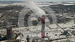 Thermal power plant pipes. Air pollution, smokestack exhaust gases. Industry zone, thick smoke plumes. Climate change