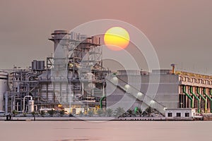 Thermal power plant at sunset