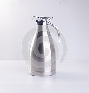 Thermo or Thermo flask from stainless stee on background.