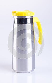 Thermo or Thermo flask from stainless stee on background.