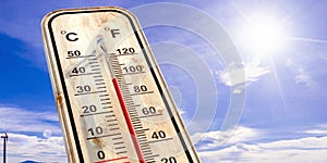 Thermometer on blue sky background, temperature forty degrees Celcius. 3d illustration