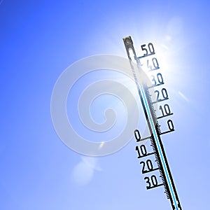 Thermometer with celsius scale showing extreme high temperature