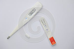 thermometer, drug and antigen test of COVD-19 photo