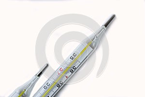 Thermometer with mercury on a white background for medicine