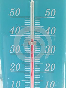 Thermometer showing 38 degrees centigrade photo