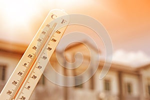 Thermometer shows the temperature is heat in the sky