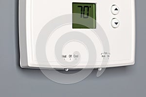 Thermostat for home furnace and air conditioner