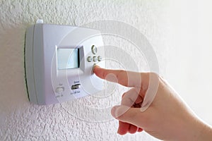 Thermostat and human hand