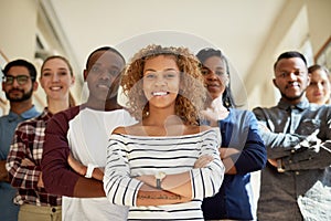 Theyre confident about securing a successful future. Portrait of a diverse group of students standing together at campus