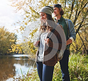 Theyre a couple of nature lovers. an affectionate young couple spending a day in nature.