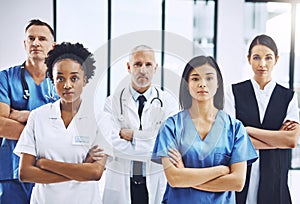 Theyre the medical team you need. Cropped portrait of a group of medical professionals standing with their arms folded