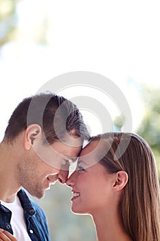 Theyre ready for forever. A young couple sharing an intimate moment outdoors.