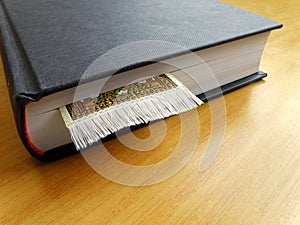 Thick book with book mark