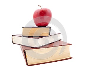 The thick books and apple