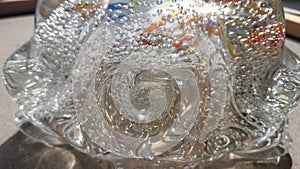 Thick bubbled colored glass texture. Glass vase.  de.