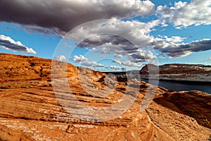 Thick clouds adding beauty to the beautiful evening at the banks of Colorado river, The Chains, Page, Arizona, USA