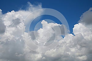 Thick Fluffy Cumulus Clouds in Sky