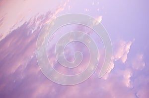 Thick fluffy pink sunset clouds background