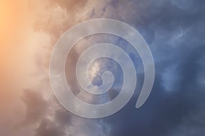 Thick fluffy sunset clouds background