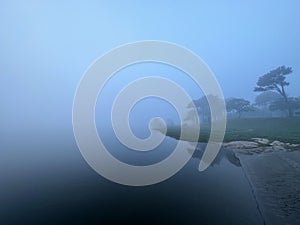 Thick fog during misty morning on the river Minho, Eiras, O Rosal, Galicia, Spain, December 2022 photo
