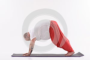 Thick guy exercising with meditation