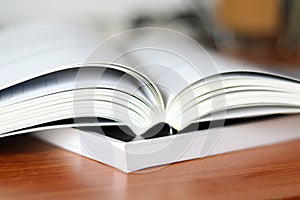 Thick heavy books with white paper and hard cover perfect binding