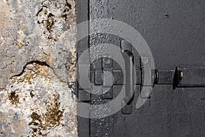 Thick iron door with a deadbolt in the bunker