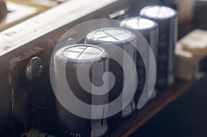 A thick layer of dust covers the internal electronic components of the computer