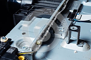 A thick layer of dust covers the internal electronic components of the computer