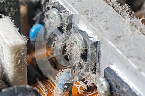 A thick layer of dust covers the internal electronic components of the computer