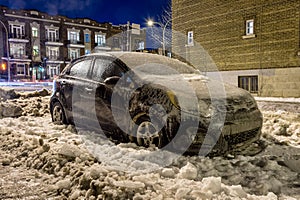 Thick layer of ice covering car