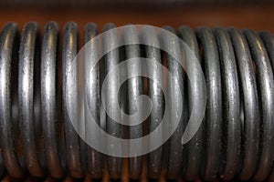 Spiral made of thick nichrome. Macro. Russia. photo