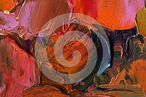 Thick oil paint. Close up view of volumetric brushstrokes of colorful paints. abstract artwork. Paint facture on canvas.