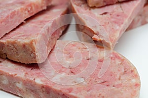 Thick slices of delicious brawn, cold cut made with flesh from the head of a pig in aspic