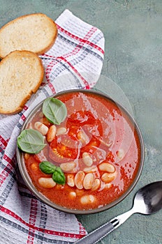 Thick tomato soup with beans