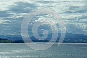 Thick white clouds over the Beauly Firth in the Highlands of Scotland